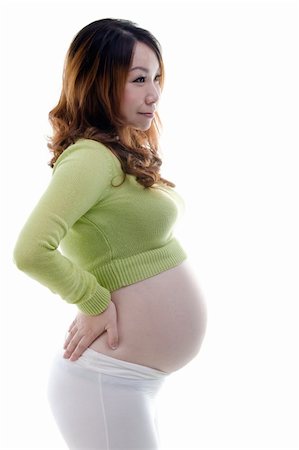 simsearch:400-05716366,k - Asian pregnant lady standing on white background Stock Photo - Budget Royalty-Free & Subscription, Code: 400-06083638