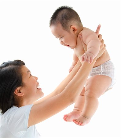 Asian mother playing with her baby boy Stock Photo - Budget Royalty-Free & Subscription, Code: 400-06083649