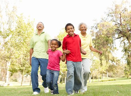 Grandparents In Park With Grandchildren Stock Photo - Budget Royalty-Free & Subscription, Code: 400-06097438