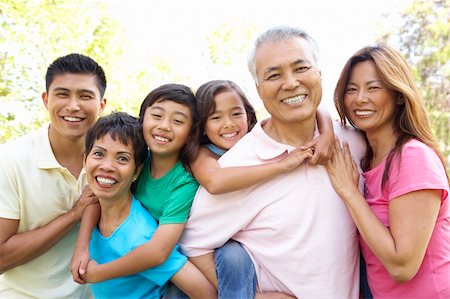 filipina mother daughter - Portrait Of Extended Family Group In Park Photographie de stock - Aubaine LD & Abonnement, Code: 400-06097551