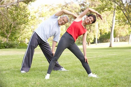 fitness asian couple - Senior Couple Exercising In Park Stock Photo - Budget Royalty-Free & Subscription, Code: 400-06097596