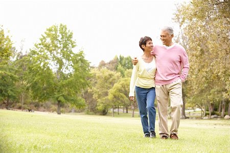 simsearch:400-04035087,k - Senior Couple Walking In Park Stock Photo - Budget Royalty-Free & Subscription, Code: 400-06097608