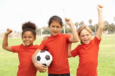 Young Boys And Girls In Football Team Stock Photo - Budget Royalty-Free & Subscription, Code: 400-06097801