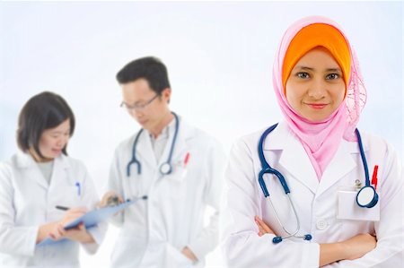 Medical team in different races standing indoor Stock Photo - Budget Royalty-Free & Subscription, Code: 400-06098675