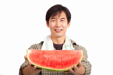 middle age asian farmer holding Watermelon isolated on white Stock Photo - Budget Royalty-Free & Subscription, Code: 400-06091152