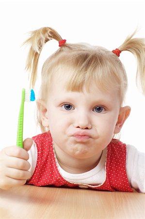 simsearch:400-04151137,k - child with toothbrush in hands Photographie de stock - Aubaine LD & Abonnement, Code: 400-06091746