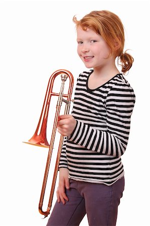 simsearch:400-04863651,k - Young girl playing a trombone on white background Stock Photo - Budget Royalty-Free & Subscription, Code: 400-06092006