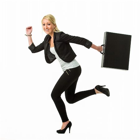 flight attendant studio - Happy young blond business woman running to work Stock Photo - Budget Royalty-Free & Subscription, Code: 400-06106292