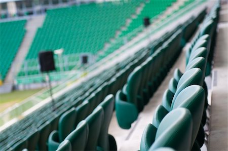 soccer arena - green empty seats at the stadium Stock Photo - Budget Royalty-Free & Subscription, Code: 400-06107617