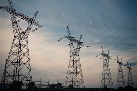 Pylon and transmission power line in sunset Photographie de stock - Aubaine LD & Abonnement, Code: 400-06107613