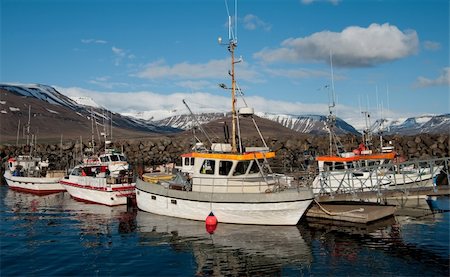 simsearch:400-05254289,k - Commercial fishing boats gather in a small harbor on the western coast of Iceland. Stock Photo - Budget Royalty-Free & Subscription, Code: 400-06107929