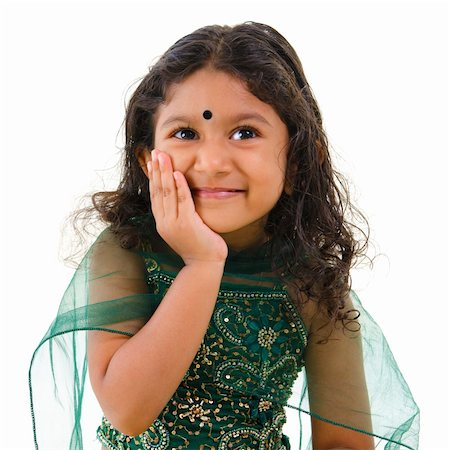 simsearch:400-06389659,k - Thoughtful little Indian girl hand on chin , isolated white background Foto de stock - Super Valor sin royalties y Suscripción, Código: 400-06108513