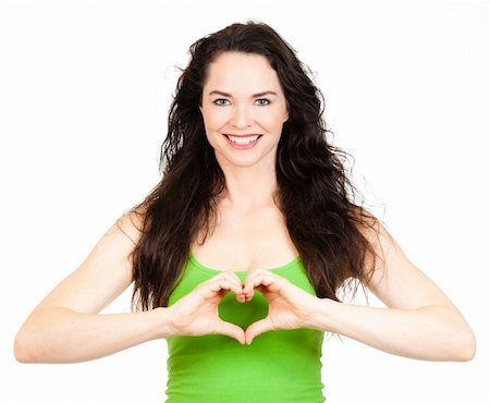 Beautiful young woman making a love heart with hands. Isolated over white. Stock Photo - Budget Royalty-Free & Subscription, Code: 400-06108673