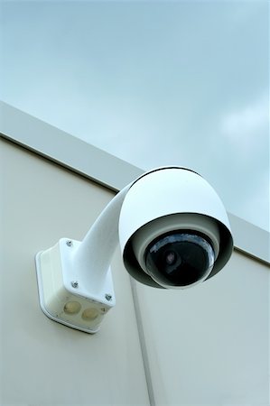 A Security camera on the side of a building Stock Photo - Budget Royalty-Free & Subscription, Code: 400-06109116