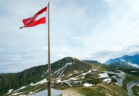 Tranquil summer Alps mountain and Austrian Flag above Grossglockner High Alpine Road Stock Photo - Budget Royalty-Free & Subscription, Code: 400-06100342