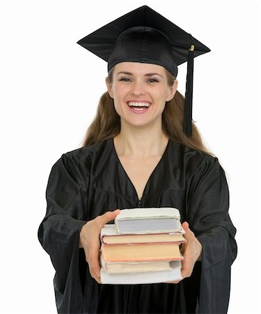 Graduation girl student giving stack of books Stock Photo - Budget Royalty-Free & Subscription, Code: 400-06100579