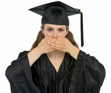 Graduation student girl making speak no evil gesture Stock Photo - Budget Royalty-Free & Subscription, Code: 400-06100583