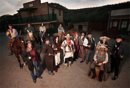 Group of tough people in old west costumes with guns Stock Photo - Budget Royalty-Free & Subscription, Code: 400-06101115