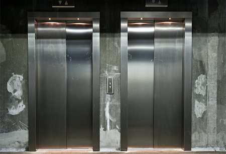 simsearch:400-04285452,k - new elevator doors with raw concrete wall Stock Photo - Budget Royalty-Free & Subscription, Code: 400-06101217