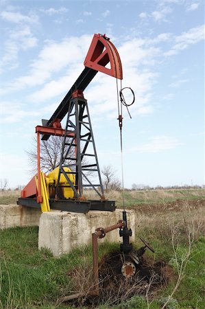 simsearch:400-04317986,k - Oil pump jack working in the field Stock Photo - Budget Royalty-Free & Subscription, Code: 400-06102189