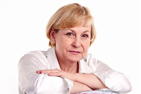 shoulder old lady white - Portrait of pretty mature woman against white background Stock Photo - Budget Royalty-Free & Subscription, Code: 400-06102928