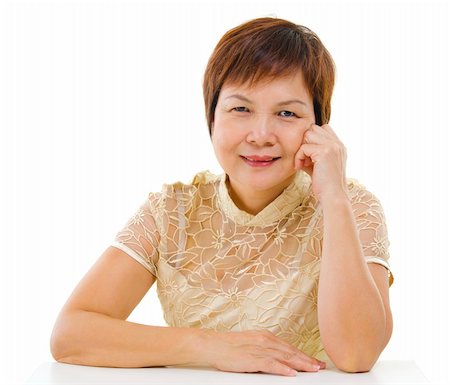 50s mixed race Asian mature woman isolated on white background Stock Photo - Budget Royalty-Free & Subscription, Code: 400-06103392