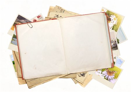 scrapbook - Old book and photos. Objects isolated over white Stock Photo - Budget Royalty-Free & Subscription, Code: 400-06103960