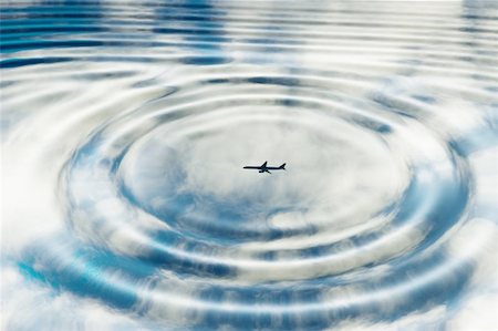 Plane reflection on rippled water surface Photographie de stock - Aubaine LD & Abonnement, Code: 400-06127340