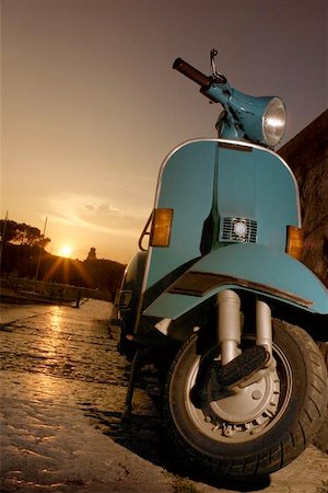 Vespa parked nearby the lake at the sunset Stock Photo - Budget Royalty-Free & Subscription, Code: 400-06128136