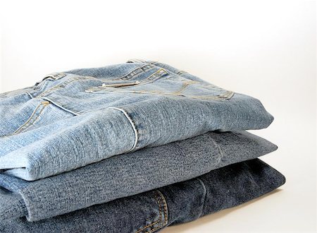 simsearch:700-02756413,k - A stack of three pairs of denimn jeans. Stock Photo - Budget Royalty-Free & Subscription, Code: 400-06128319