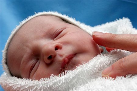 New born baby being examined Stock Photo - Budget Royalty-Free & Subscription, Code: 400-06129664