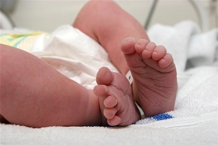 premature - New born baby's two feet Stock Photo - Budget Royalty-Free & Subscription, Code: 400-06129665