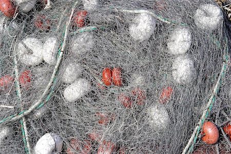 simsearch:6118-08910527,k - Fishing nets out to dry, port cala bona, mallorca, majorca, spain Photographie de stock - Aubaine LD & Abonnement, Code: 400-06129970