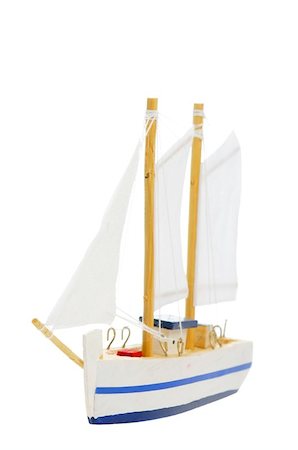 toy sailing boat on white background Stock Photo - Budget Royalty-Free & Subscription, Code: 400-06134314