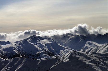 peaked cap - Mountains in sunset. Caucasus Mountains, Georgia, Gudauri. Stock Photo - Budget Royalty-Free & Subscription, Code: 400-06135651