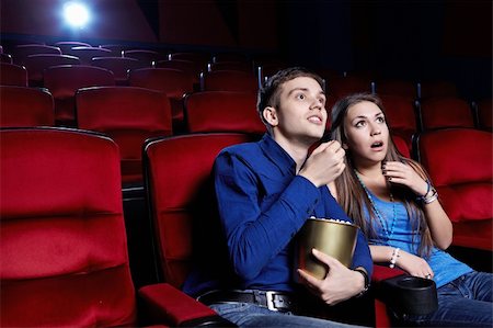 Surprised a couple at the cinema Stock Photo - Budget Royalty-Free & Subscription, Code: 400-06135934