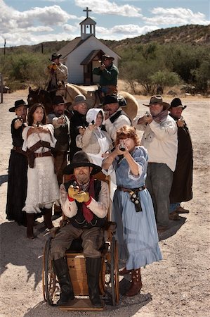 People in American old west scene with weapons in front of church Stock Photo - Budget Royalty-Free & Subscription, Code: 400-06136054