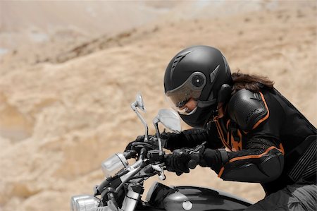 A motorcyclist in a desert Stock Photo - Budget Royalty-Free & Subscription, Code: 400-06136199