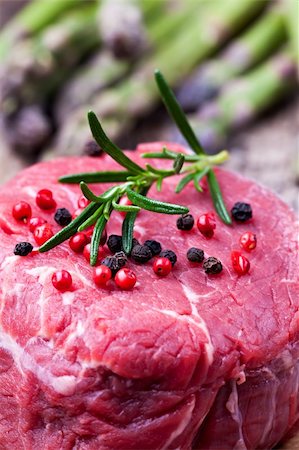 raw steak with asparagus on wood Stock Photo - Budget Royalty-Free & Subscription, Code: 400-06136764