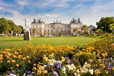 Jardin du Luxembourg with the Palace and statue. Few flowers are in front and blue sky behind. Stock Photo - Budget Royalty-Free & Subscription, Code: 400-06137111