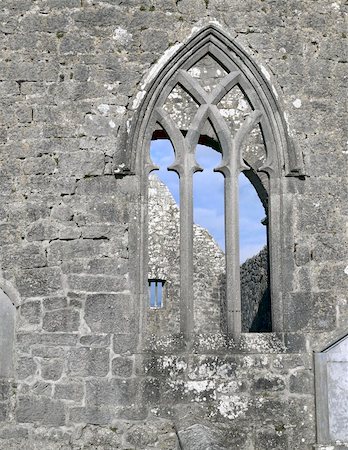 simsearch:400-05732778,k - Ruins of Kilmacduagh Monastery, County Galway, Ireland. Window Stock Photo - Budget Royalty-Free & Subscription, Code: 400-06137744