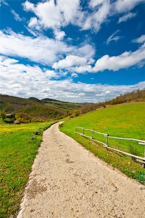 Wattle Fence along Dirt Road Leading to the Farmhouse in Tuscany, Italy Stock Photo - Budget Royalty-Free & Subscription, Code: 400-06138609