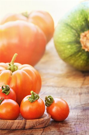 simsearch:400-04393672,k - Fresh tomatoes and vegetables on wooden background Stock Photo - Budget Royalty-Free & Subscription, Code: 400-06139540