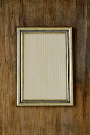 dirty nails - vintage frame on wooden wall interior element Stock Photo - Budget Royalty-Free & Subscription, Code: 400-06139672