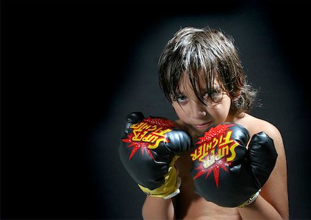 Boy with boxing gloves Stock Photo - Budget Royalty-Free & Subscription, Code: 400-06133229