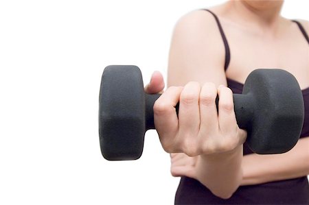 young woman working out with dumbells Stock Photo - Budget Royalty-Free & Subscription, Code: 400-06144200