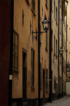 sweden window lamp - Antique buildings in a dark and narrow alley in Stockholm old town (Gamla stan), Sweden Stock Photo - Budget Royalty-Free & Subscription, Code: 400-06140220