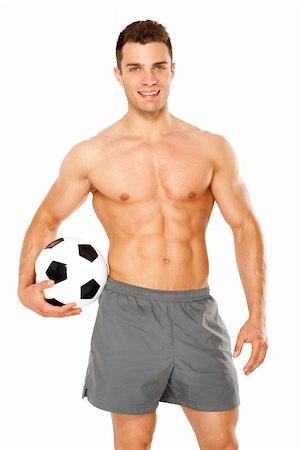 foot model - Sporty man holding foot ball on white background Photographie de stock - Aubaine LD & Abonnement, Code: 400-06140649