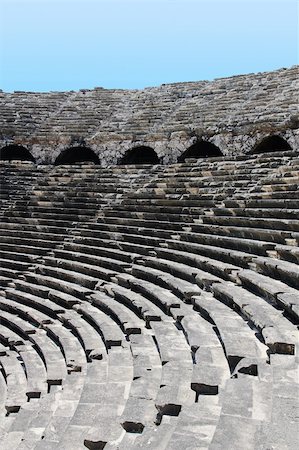 simsearch:400-06642892,k - Old circle theater in Side, archeology background. Constructed by Greece architect during past time. Turkey. Stock Photo - Budget Royalty-Free & Subscription, Code: 400-06140790