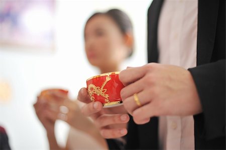 Traditional Chinese wedding tea ceremony, focus on teacup Stock Photo - Budget Royalty-Free & Subscription, Code: 400-06141575